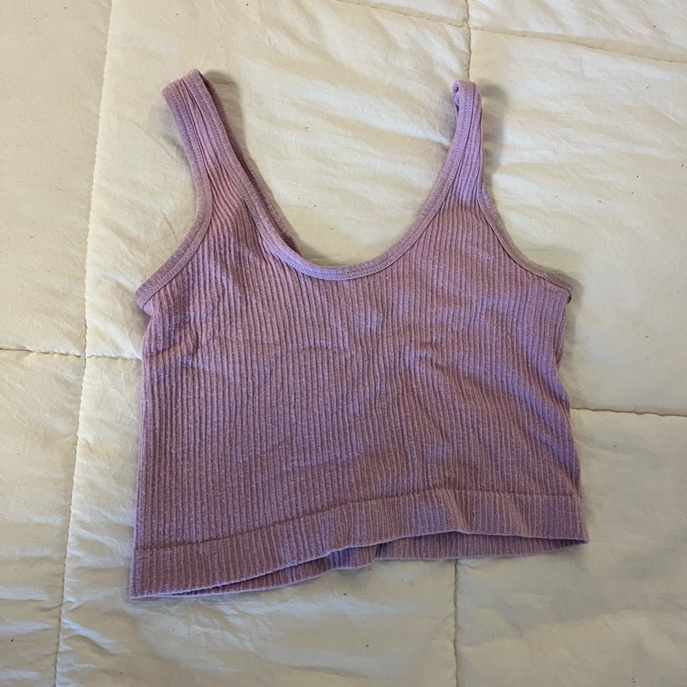 Out from under pink tank